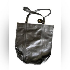 Roots leather tote never used